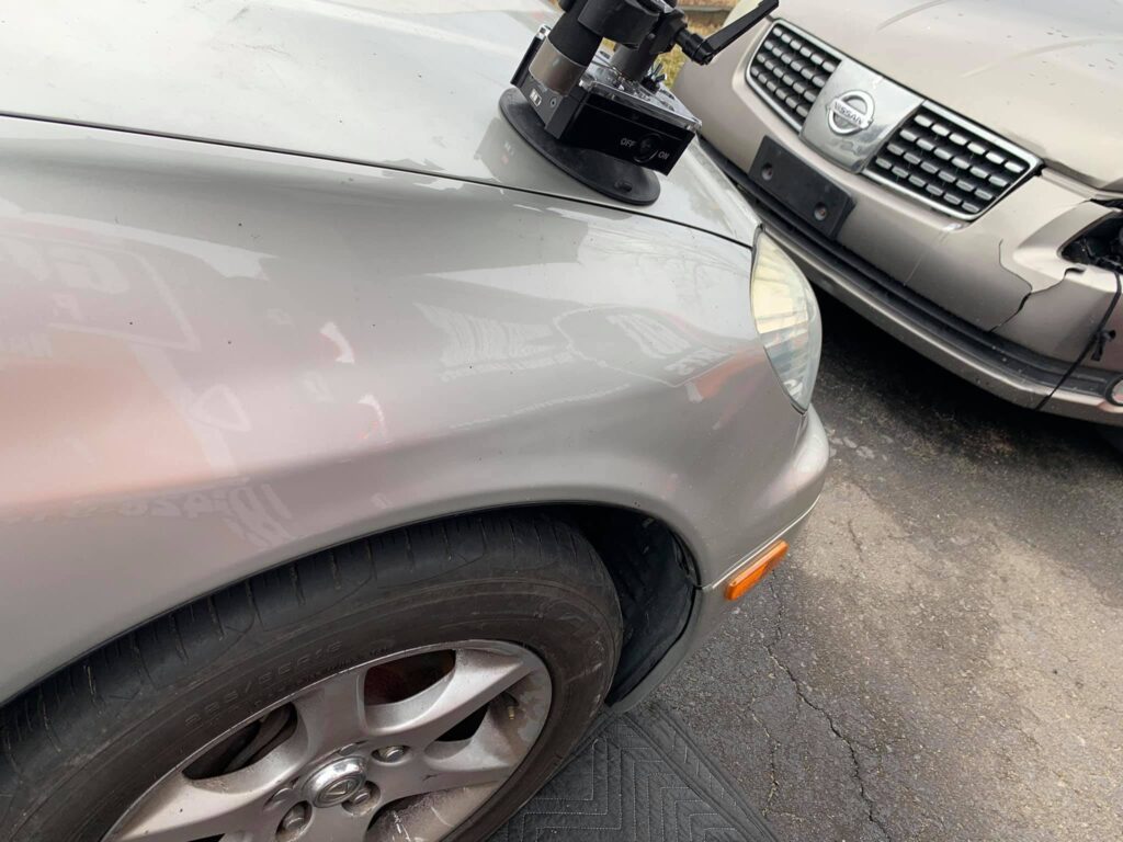 Silver 4-Door Apex Dent Repair Near Me