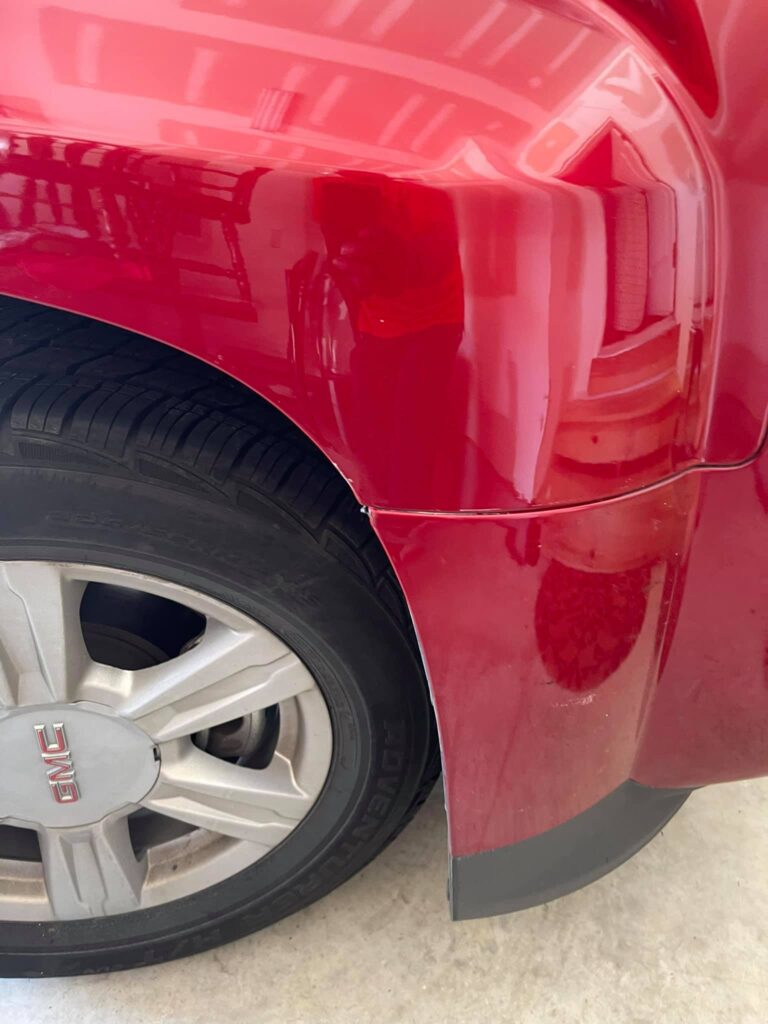 Red Truck Wheel Well Dent Removal After